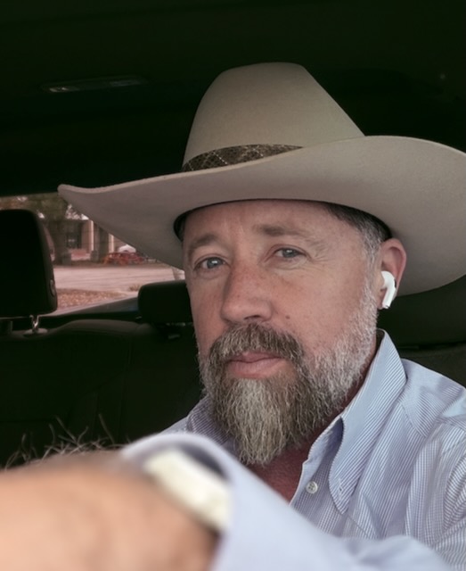 Michael Vowell wearing a cowboy hat, author, chaplain and Bible teacher